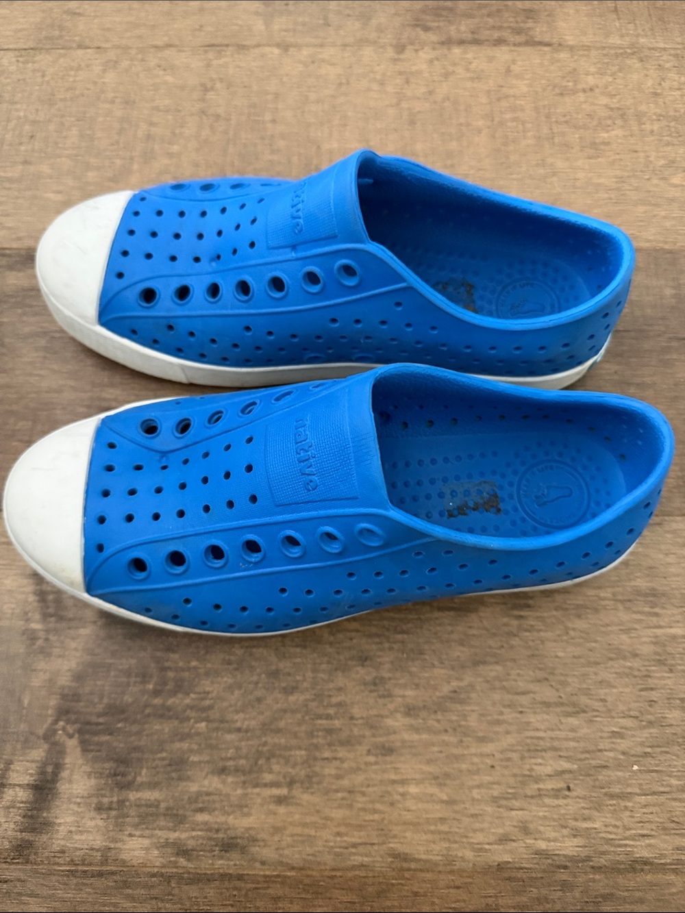 Native Blue Slip-On Perforated Sandals with White Toe Cap